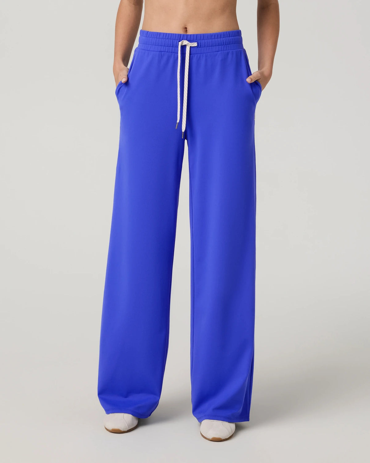 Vuori Halo Essential Wideleg Pant Women’s in Electric Blue – on model