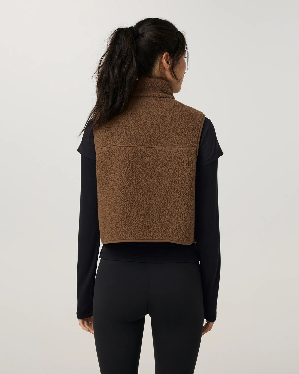 Vuori Alpine Vest Women’s in Bourbon – on model