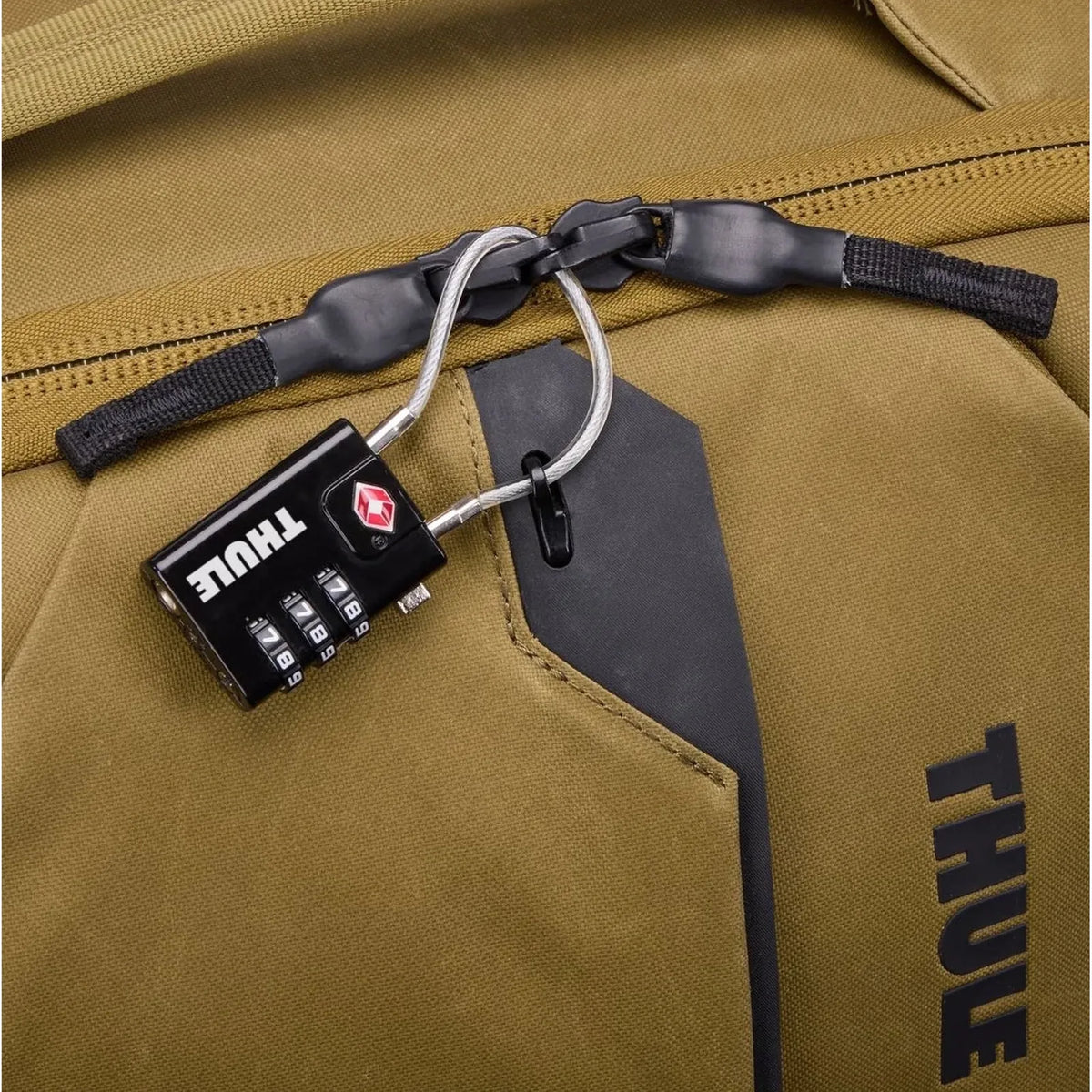 Thule TSA Cable Lock in BLACK securing the zippers of a Thule bag