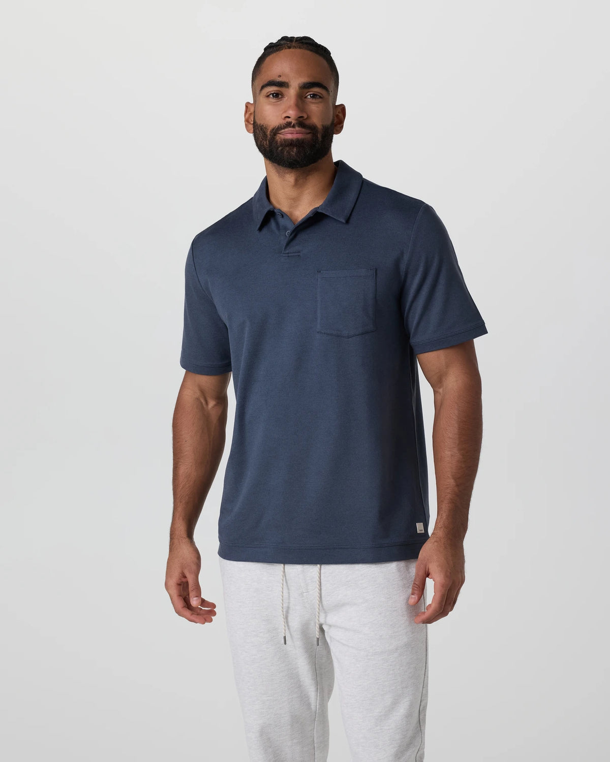 Vuori Short Sleeve Ponto Performance Polo Men’s in Azure Heather – on model