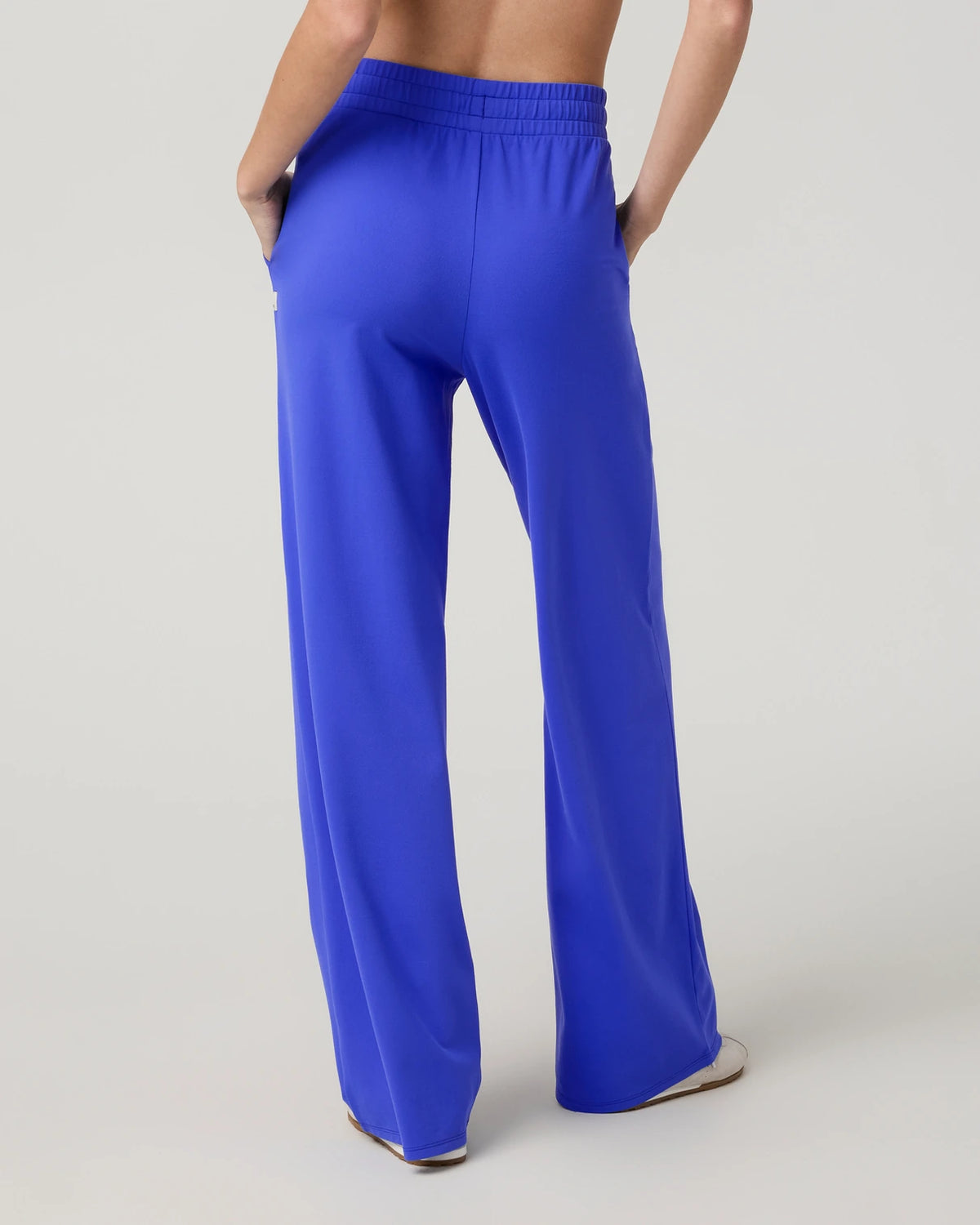 Vuori Halo Essential Wideleg Pant Women’s in Electric Blue – on model