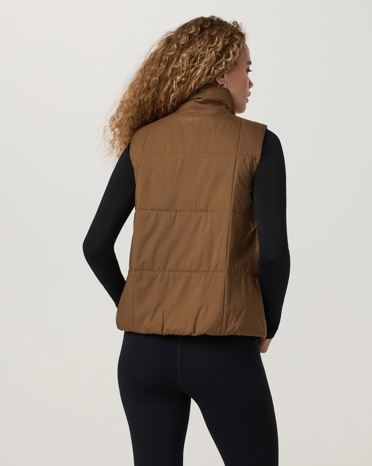 Vuori Canyon Insulated Sporty Vest Women’s in Bourbon – on model