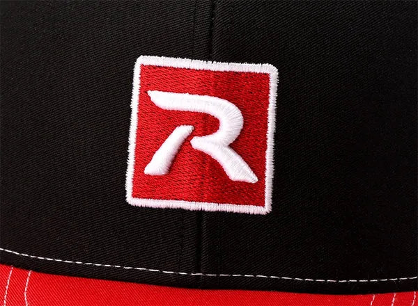 Raised embroidered R logo stitched on a black cap