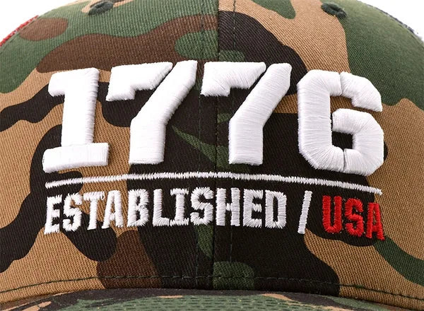 Tonal embroidered logo on a light cap