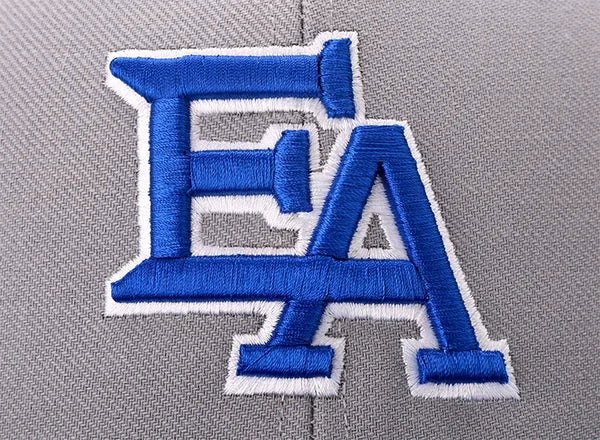 Embroidered logo stitched on a cap crown