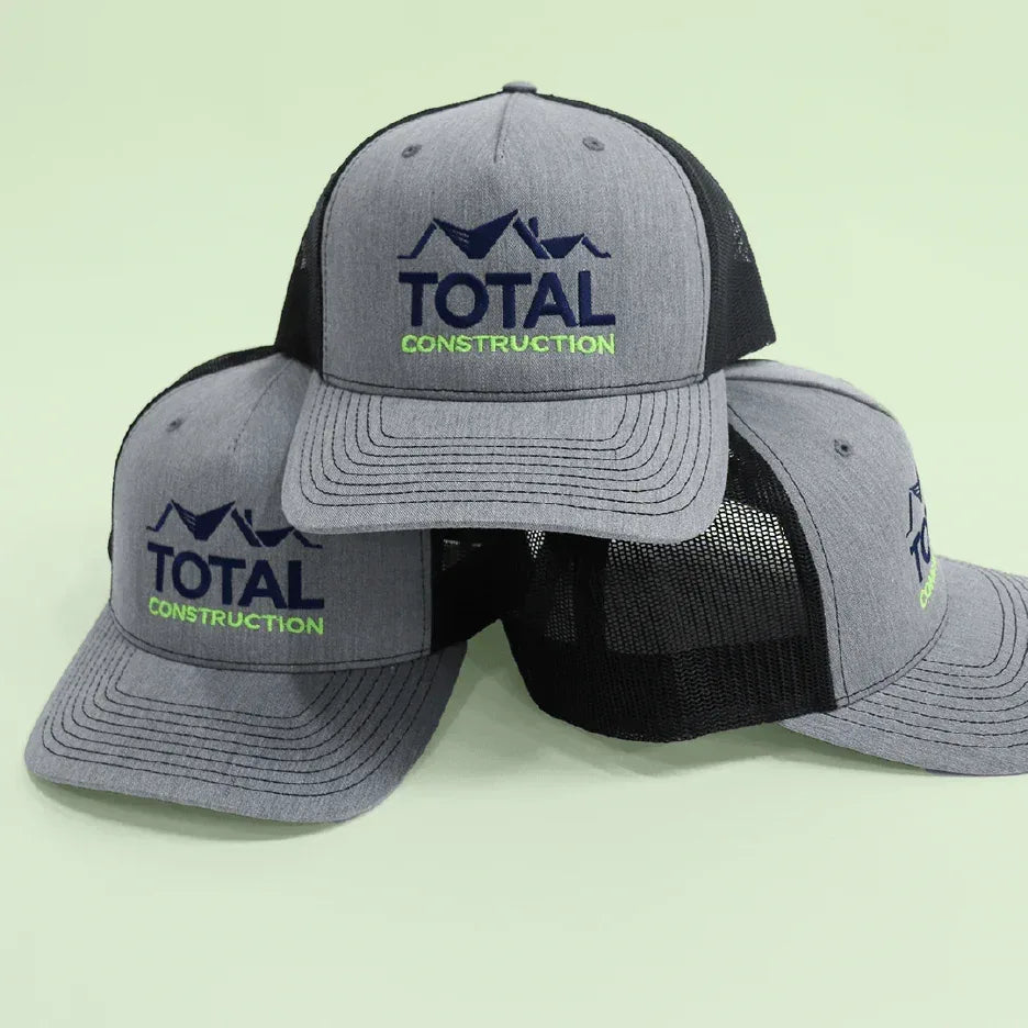 Grey flat-bill hat with a rectangular woven patch