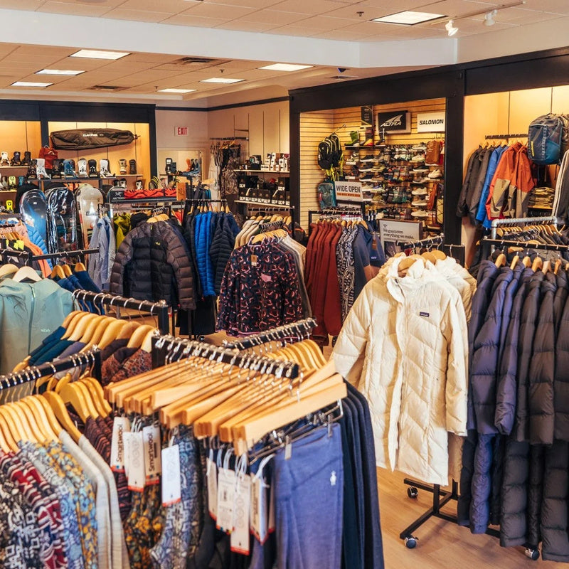 Inside the Ridge & River shop: racks of winter jackets, packs and footwear